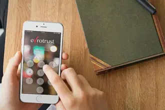 Mobile phone with Evrotrust sign in screen
