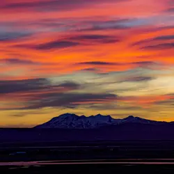 Mountains on the horizon at sunset.