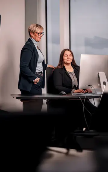 Two women in office