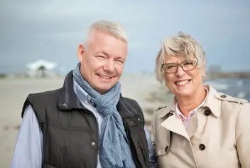 Couple walking at the beach
